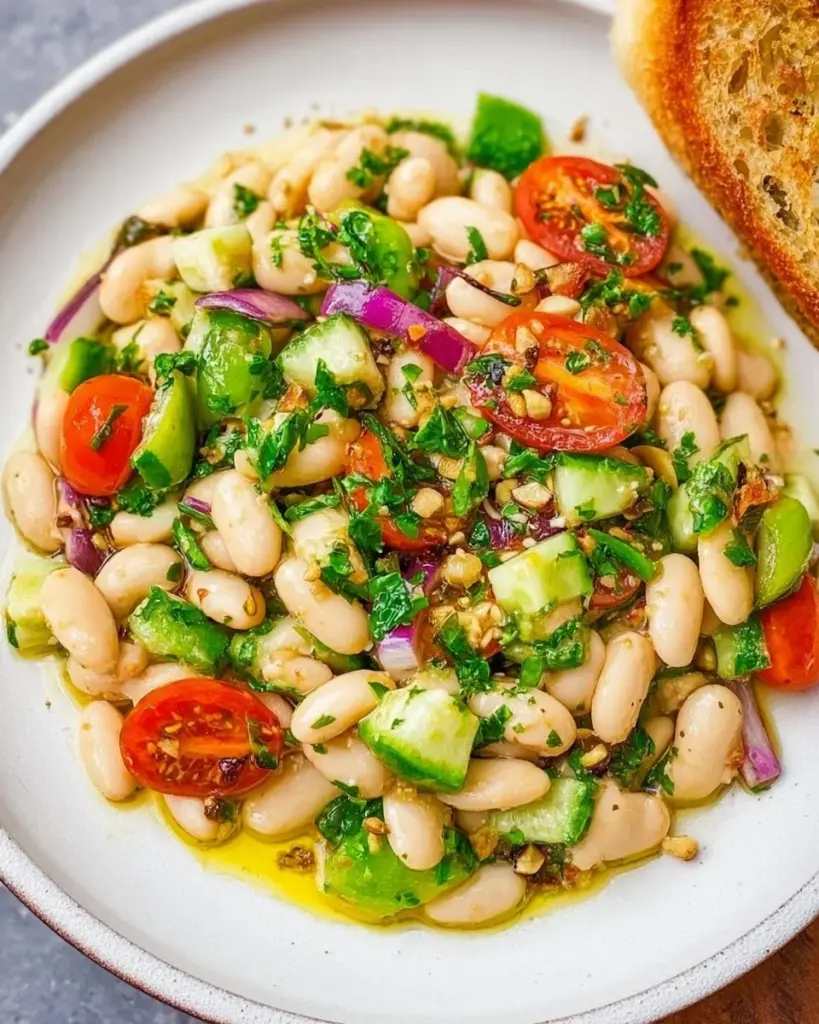 Mediterranean White Bean Salad with fresh vegetables and herbs
